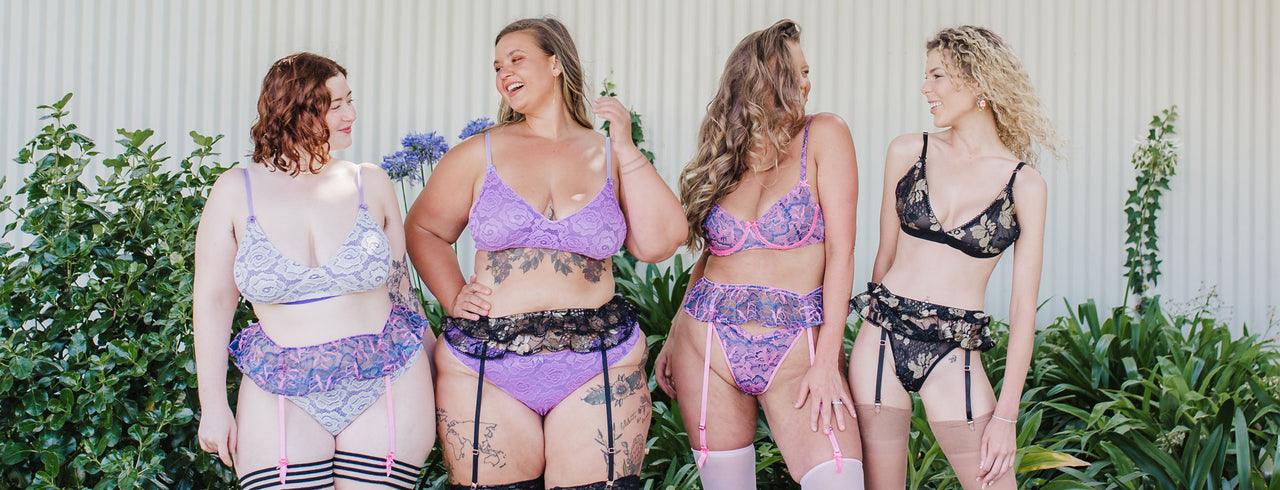  Models of different sizes look happy whilst wearing Holly Lulu lingerie sets.